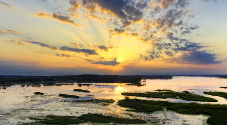 Aerial view of beautiful sunset over the lake. Nature background.