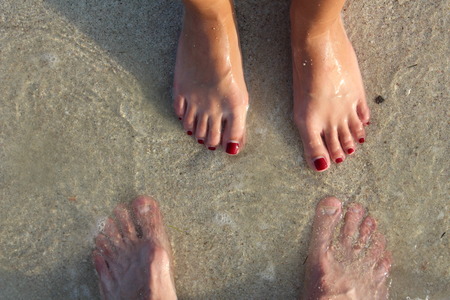 Female and male foots. - Stock Imageの写真素材