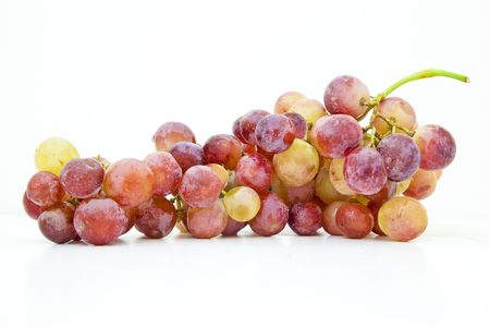 Fresh Colored Grapes isolated on a white backgroundの写真素材