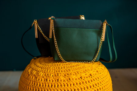 Multi-colored leather bags, in a room with a good interior and beautiful colored furniture,...