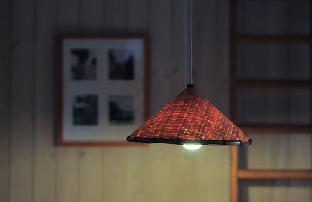 Lamp with photoframe and wooden stairs on a backgroundの写真素材