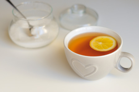 Grey ceramic cup with heart decoration,の写真素材