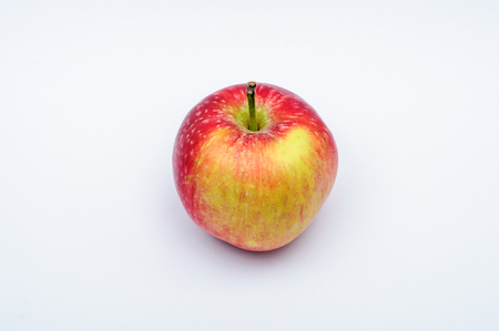 Red yellow apple isolated on white backgroundの写真素材