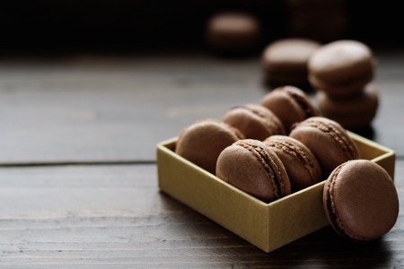 Chocolate cocoa French biscuits macarons with coffeeの写真素材