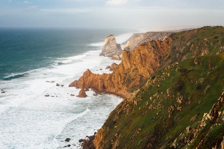 Cabo da Roca most western point of Europe at sunset. Ocean wavesの写真素材