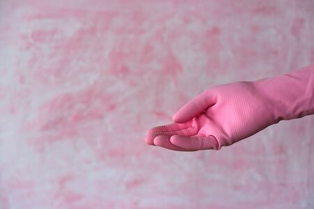 Pink outstretched hand gesture. Left hander day conceptの写真素材