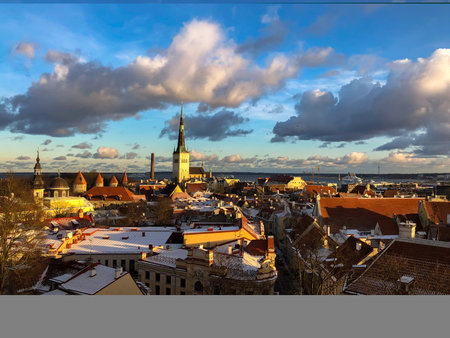 Tallinn, Estonia - December 1, 2019: View to old town in Tallinn from viewpoint. Sunny day, red roofsの写真素材