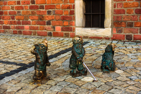 Wroclaw, Poland - June 25, 2019: City symbol landmark sculpture dwarfs in different situations. Krasnoludki, gnomesのeditorial素材