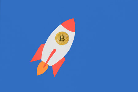 Bitcoin flying on paper rocket to up. Growth conceptの写真素材