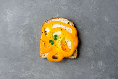 Healthy vegetarian sandwiches with vegetables - yellow pepper. Cream cheese and microgreensの写真素材