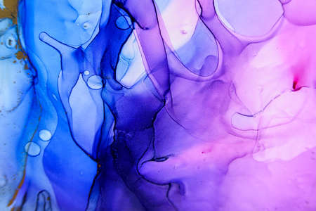 Abstract alcohol ink fluid art background in blue, purple, pink and goldの写真素材