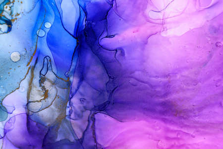 Abstract alcohol ink fluid art background in blue, purple, pink and goldの写真素材