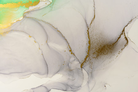 Abstract alcohol ink fluid art background. Grey color with gold