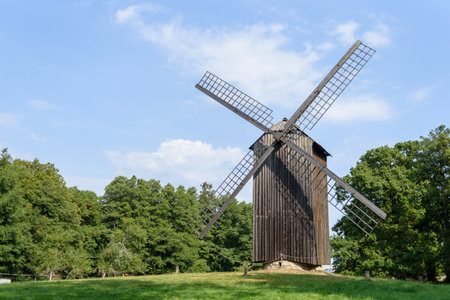 Old Estonian Wooden windmill in open air  m at summer dayの写真素材