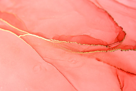 Abstract alcohol ink fluid art background. Red color with goldの写真素材