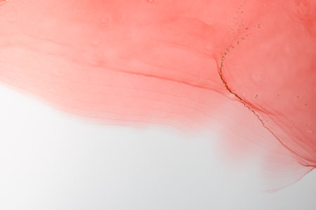 Abstract alcohol ink fluid art background. Red color with goldの写真素材
