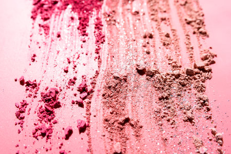 Abstract waves composition made from crushed face powder and blush on pink backgroundの写真素材