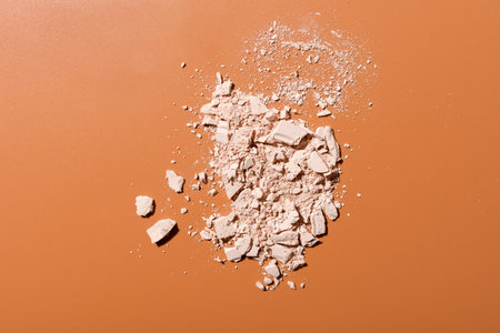 close up of make up powder on beige background, top viewの写真素材
