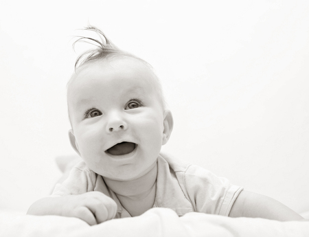 portrait smiling baby in black and whiteの写真素材