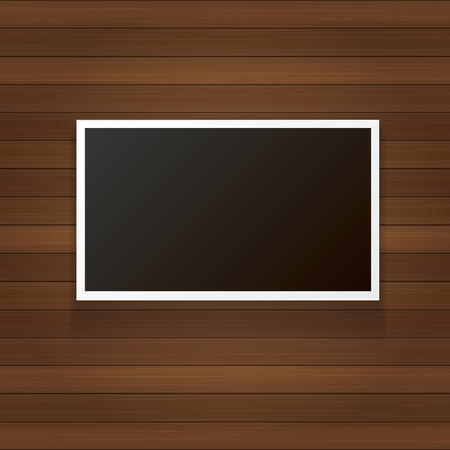 vintage photo frame with shadow isolated on wooden wall background. Vector Photo realistic Mockups with empty space for photo.のイラスト素材