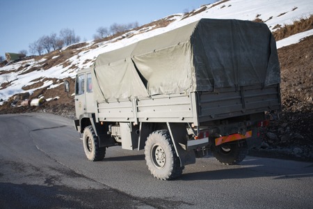 Old truck for transporting people in the mountains.の写真素材