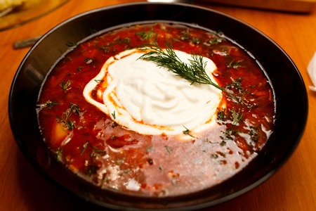 Borscht with sour cream and herbsの写真素材