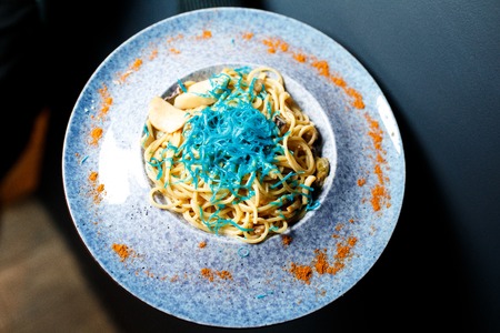 Pasta with blue cheese and fresh basilの写真素材