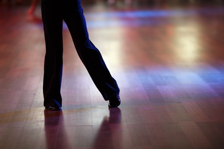 Closeup of dancers legs as they do the ballroom danceの写真素材