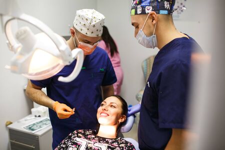 Dental treatment at dentist's office before removal of a tooth.のeditorial素材