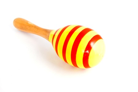 yellow wood maracas with red stripe isolated on white backgroundの写真素材