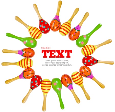 colorful wooden toy maracas frame music percussion instrument isolated on white backgroundの写真素材