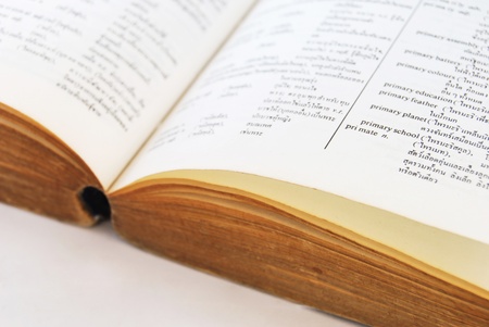 closeup of old paper dictionary book backgroundの写真素材