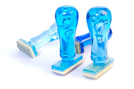 blue rubber stamp , office stationery tool isolated on white backgroundの写真素材