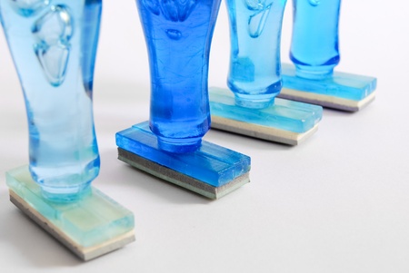 blue rubber stamp , office stationery tool isolated on white backgroundの写真素材