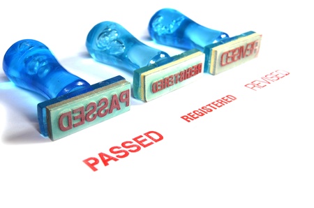 Passed letter on blue rubber stamp isolated on whiteの写真素材