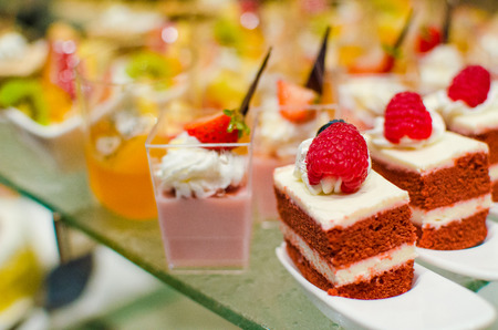 Variety of cakes for catering and buffet in restaurantの写真素材