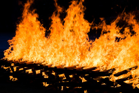 Fire burning wood pile , closeup abstract backgroundの写真素材