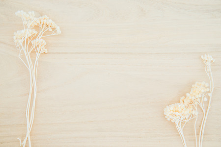 Wood texture background with dried flower decoration with empty space for decorationの写真素材