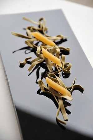 Italian pasta, penne and spinach tagliatelleの写真素材