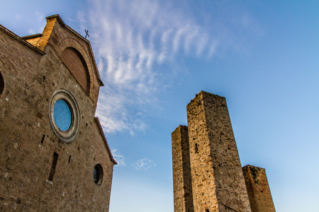 San Gimignano Dome and Towers during Sunset - San Gimignano, Tuscany, Italyの写真素材