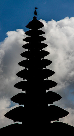 Beautiful black roof of hindu temple Ulun Danu at Betaran Lake - north Bali, Indonesiaの写真素材