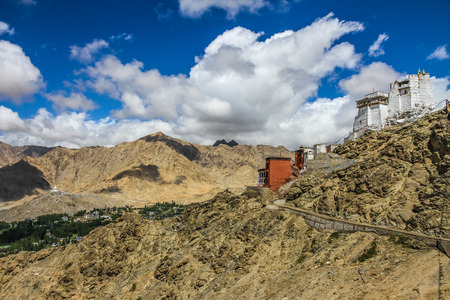 Leh Royal Palace with Buddhist temple and Leh city below - Leh, Ladakh, Indiaのeditorial素材