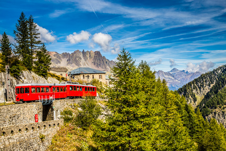 Beautiful View Of Red Train Going To Montenvers Mer de Glace Station During Summer Day-Mont Blanc Massif,Chamonix,Franceの写真素材