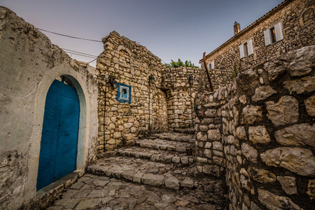 Blue Gate In The Stone Wall - Himara Castle, Vlore, Albania, Europeのeditorial素材