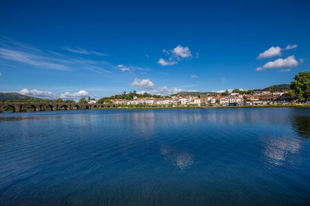 Medieval Bridge Crossing River Lima And City Centre Of Ponte De Lima, Alto Minho, Portugal, Europeの写真素材