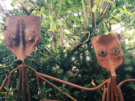 metal statue facesの写真素材