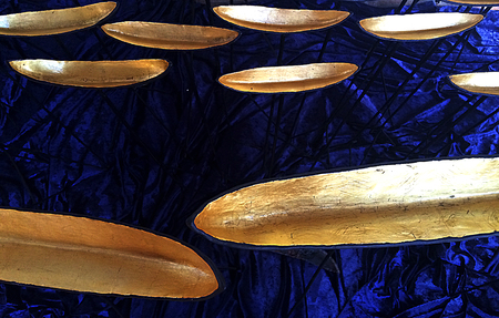 abstract blue sea and gold boatsの写真素材