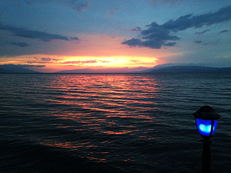 The beautiful romantic sunset view with blue lightの写真素材