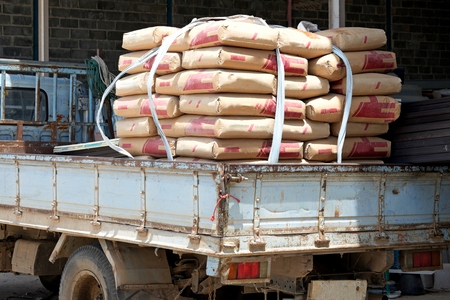 Heap of cement bags waiting for transport to customerの写真素材