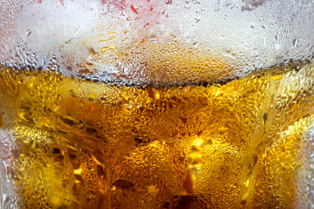 droplets from glass of soft drink. use for background, articles, columm, web design, or other you wantの写真素材